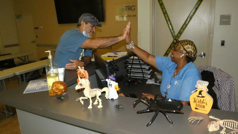 Man and woman high fiving